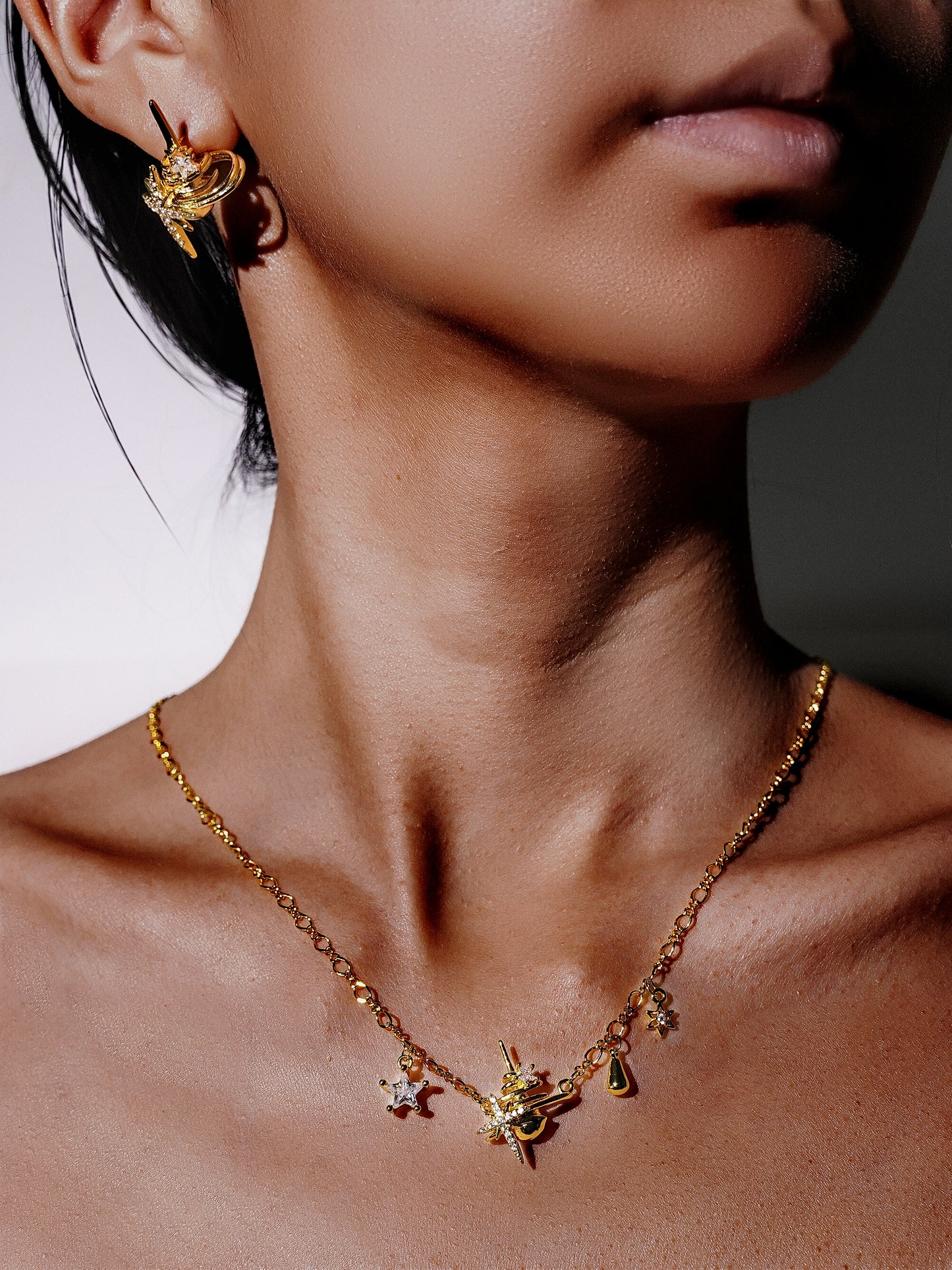 14K Gold Starburst necklace and star and teardrop charms-04