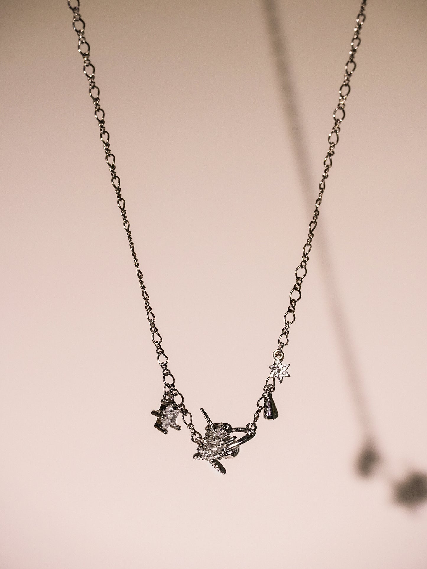 14K Gold Starburst necklace and star and teardrop charms-05