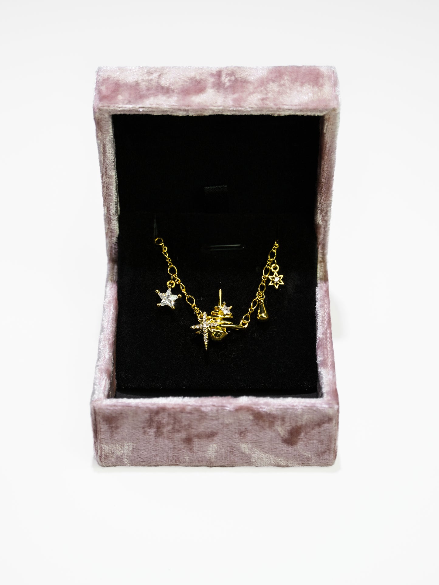 14K Gold Starburst necklace and star and teardrop charms-08