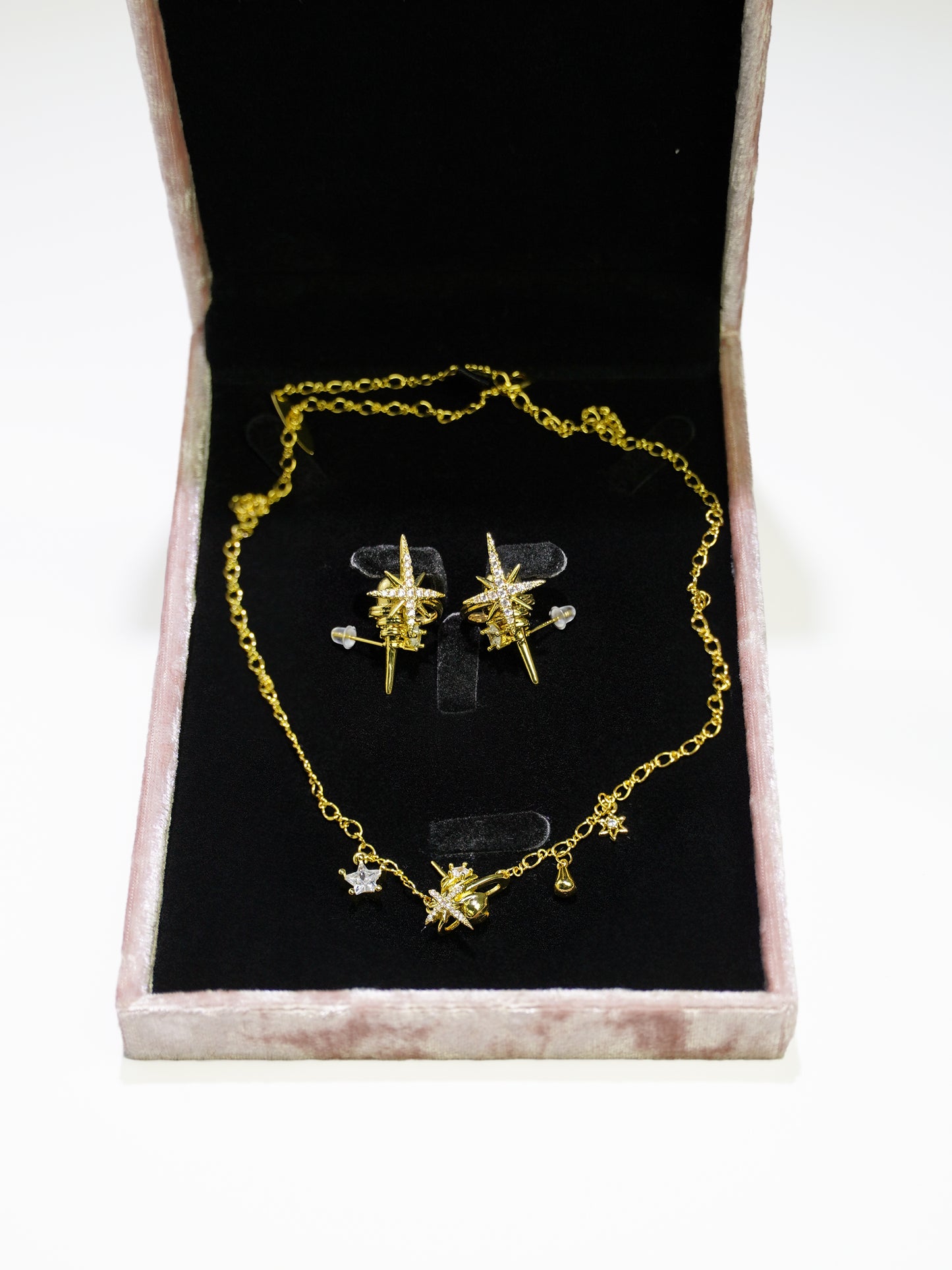 14K Gold Starburst necklace and star and teardrop charms-09